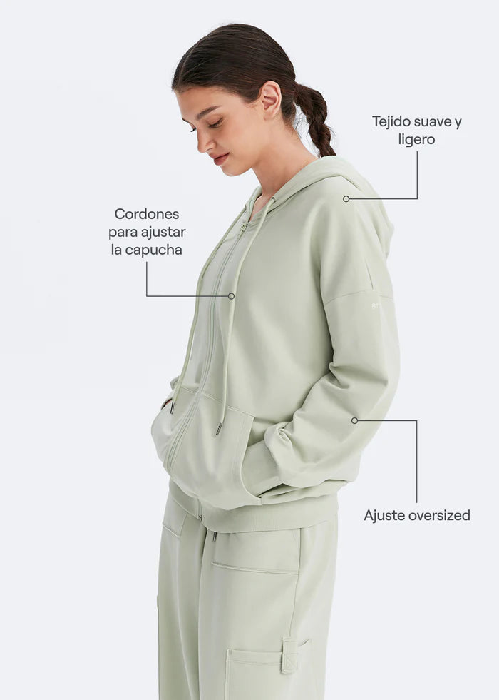 Sudadera con cremallera y bolsillos
